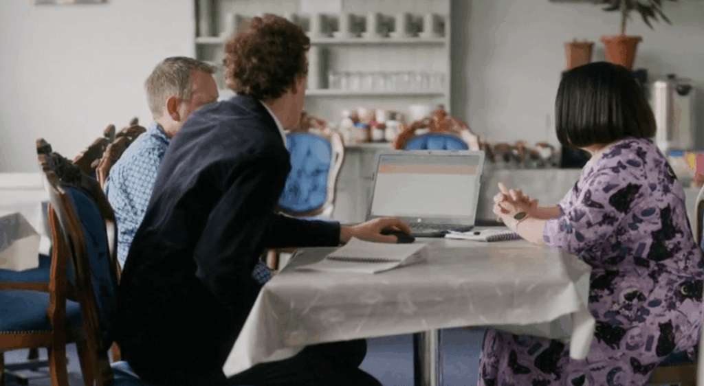 owain llloyd-williams showing two people ways in which they can optimise their website